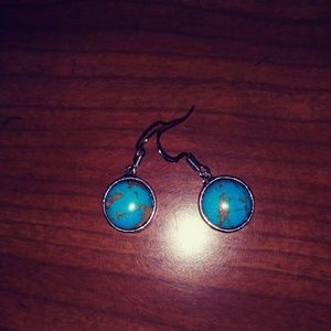 New in pkg : silver with turquoise .